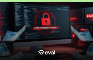 Imagem de um computador com cadeado e abaixo escrito em inglês ataque ransomware em vermelho e dinheiro espalhados pela imagem.